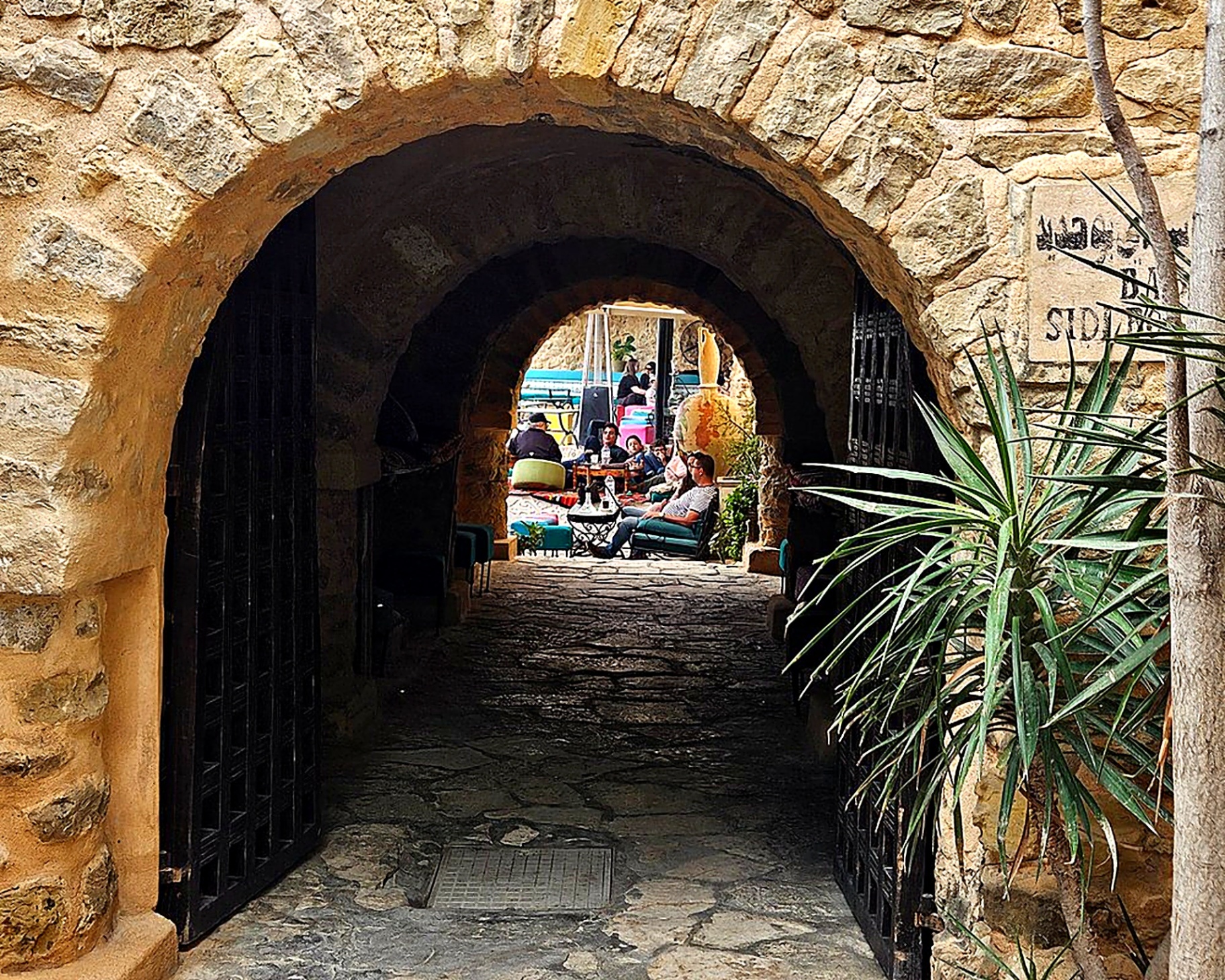 Traditional stone archway in the old medina of Hammamet