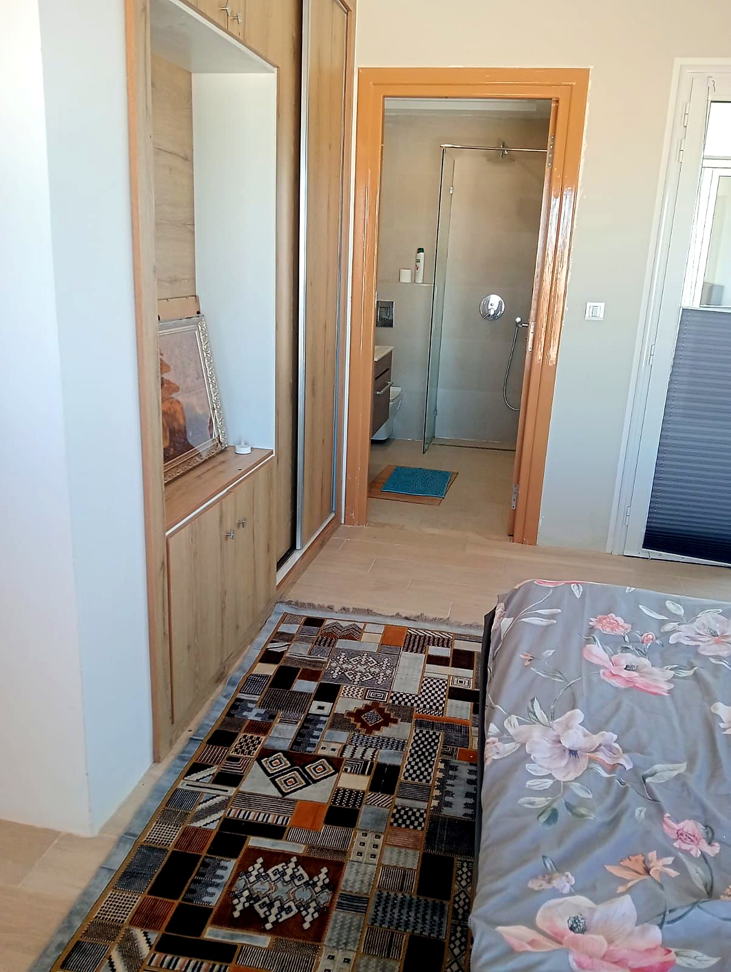 Bedroom with fitted wardrobe and modern en-suite walk-in shower